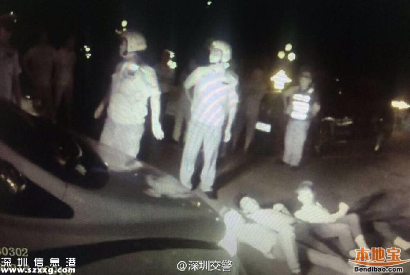 深圳查酒駕現(xiàn)奇葩 朋友被抓4人躺地攔警車(組圖)