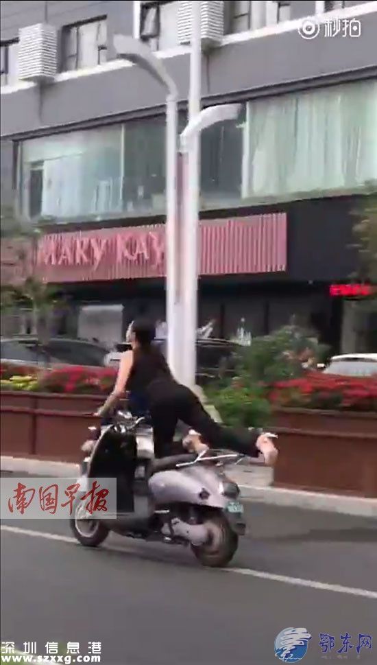 女騎手乘電驢飛行 女子電驢上大玩“雜耍”太危險(xiǎn)